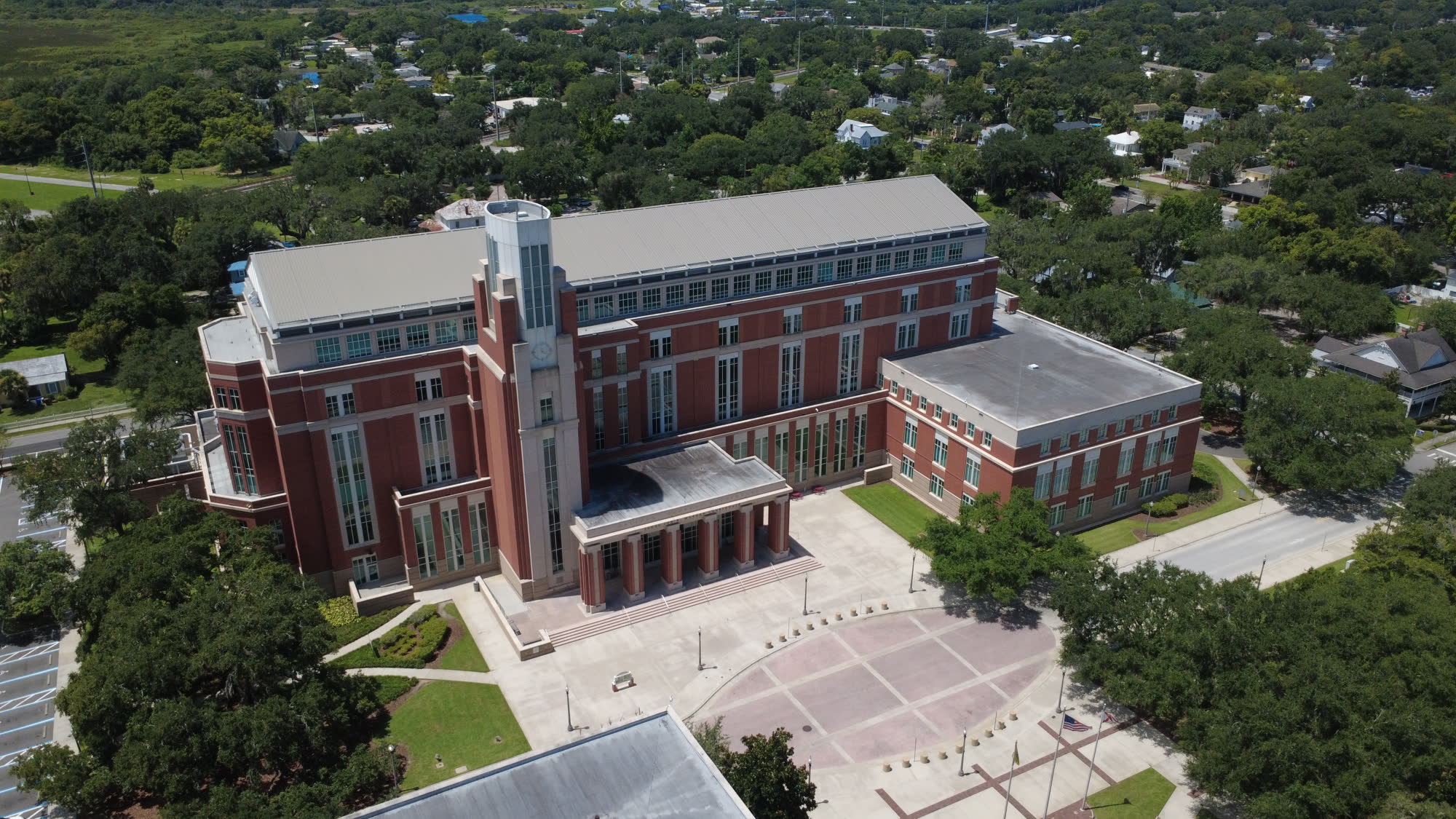 The Osceola County Courthouse and its clock tower rising over Kissimmee