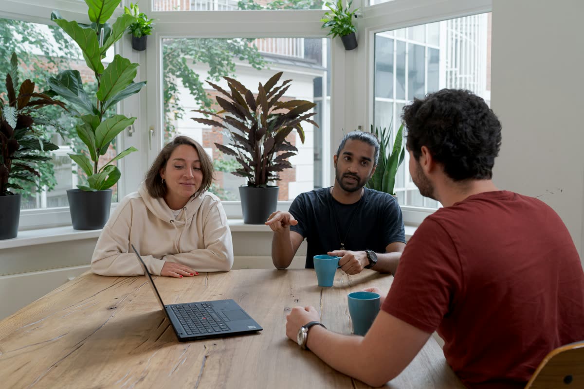 Austin Munday meeting with homebuyers for an initial consultation